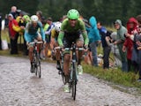 Lars Boom of The Netherlands and the Belkin Pro Cycling Team enters the final sections of cobbles en route to victory in the fifth stage of the 2014 Tour de France on July 9, 2014