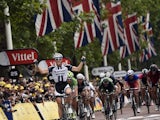 Giant-Shimano rider Marcel Kittel of Germany crosses the line in first place at the end of stage three of the 2014 Tour de France in London on July 7, 2014