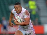 Marcus Watson of England scores a try against Kenya during the IRB Glasgow Sevens - Day Two at Scotstoun Stadium on May 4 2014 in Glasgow, Scotland