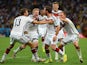 Mario Goetze of Germany (C) celebrates scoring his team's first goal in extra time with teammates Thomas Mueller, Andre Schuerrle and Toni Kroos on July 13, 2014