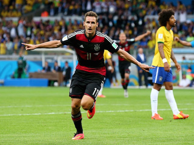 Miroslav Klose of Germany celebrates scoring his team's second goal during the 2014 FIFA World Cup semi final against Brazil on July 8, 2014