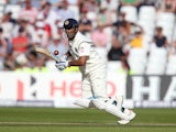 Mahendra Singh Dhoni of India takes a run during day one of the 1st Investec Test between England and India at Trent Bridge on July 9, 2014