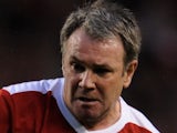 Ray Houghton of Liverpool Legends in action during the Hillsborough Memorial match between Liverpool Legends and All Stars XI at Anfield on May 14, 2009