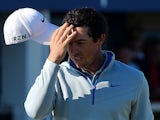Rory McIlroy of Northern Ireland reacts on the 18th green during the Aberdeen Asset Management Scottish Open second round at Royal Aberdeen Golf Club on July 11, 2014