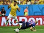 Brazil's defender and captain Thiago Silva (L) reacts after fouling Netherlands' forward Arjen Robben in the penalty area during the third place play-off football match  on July 12, 2014
