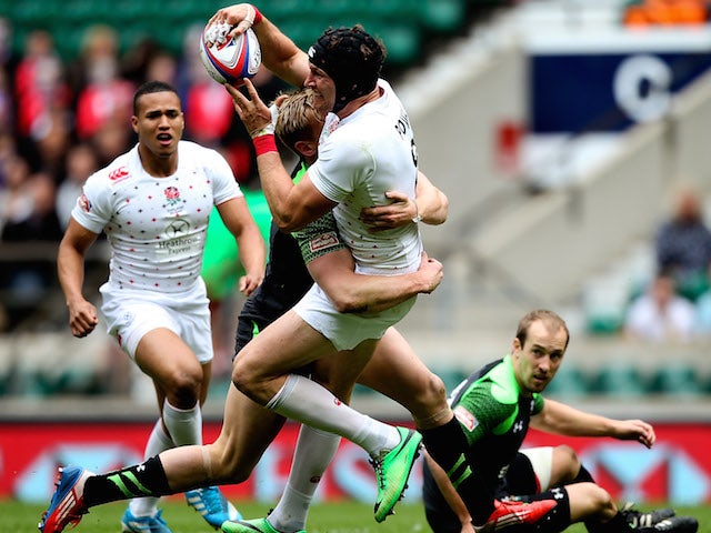Tom Powell of England is tackled during the Marriot London Sevens match between England and Wales at Twickenham Stadium on May 10, 2014 in London, England