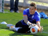 Valencia's goalkeeper Vicente Guaita stops a ball during a training session at Ciudad Deportiva Paterna, in Paterna on April 30, 2014