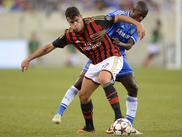 Chelsea's Ramires and AC Milan's Andrea Petagna vie for the ball during a 2013 International Champions Cup match at MetLife stadium in East Rutherford, New Jersey, on August 4, 2013