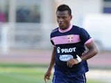 Evian's Colombian forward Andres escobar runs with the ball during the French L1 friendly football match Evian (ETGFC) vs Cannes on August 3, 2013