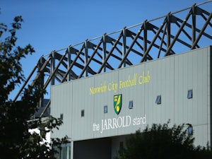 Norwich suspend two supporters