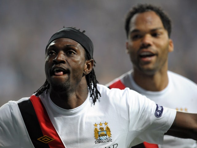 Emmanuel Adebayor of Manchester City reacts after scoring a goal against Lech Poznan during their UEFA Europa League football match on November 4, 2010