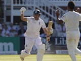 Englands Gary Ballance celebrates as he runs to reach a century not out during play on the second day of the second cricket Test match between England and India at Lord's cricket ground in London on July 18, 2014