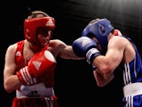Joe Ham of Scotlandlands a punch on Sean McGoldrick of Wales in their 56kg bout during the Great Britain Amateur Boxing Championship Finals at York Hall on November 12, 2011 