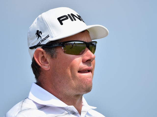 Lee Westwood of England waits on the ninth tee during the second round of The 143rd Open Championship at Royal Liverpool on July 18, 2014