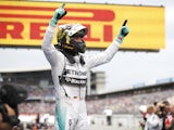 Nico Rosberg of Germany and Mercedes GP celebrates in Parc Ferme after victory in the German Grand Prix at Hockenheimring on July 20, 2014