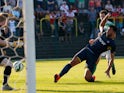 Graziano Pelle of Southampton scores his second goal during the pre-season friendly match between KSK Hasselt and Southampton at the Stedelijk Sportstadion on July 17, 2014