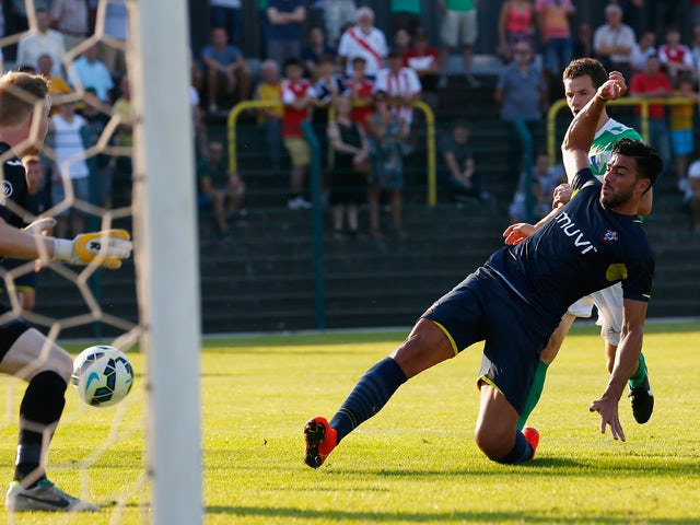 Graziano Pelle of Southampton scores his second goal during the pre-season friendly match between KSK Hasselt and Southampton at the Stedelijk Sportstadion on July 17, 2014