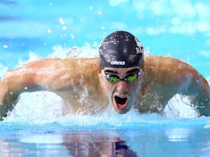 Barrett qualifies fastest for 100m butterfly final