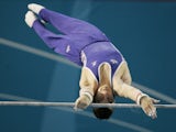 Adam Cox of Scotland competes in the Men's Horizontal Bar Final in the artistic gymnastics at the Rod Laver Arena during day six of the Melbourne 2006 Commonwealth Games on March 21, 2006 