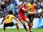 Wales's Adam Thomas passes the ball on July 26, 2014