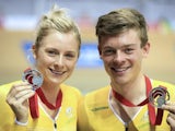 Siblings Alex and Annette Edmondson pose with their cycling medals on July 25, 2014