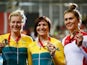 Silver medalist Stephanie Morton of Australia, Gold medalist Anna Meares of Australia and bronze medalist Jess Varnish of England celebrate on the podium during the medal ceremony for the Women's 500m Time Trial at Sir Chris Hoy Velodrome during day one o
