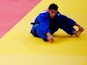 Ashley Mckenzie of Great Britain sits on the mat in the Men's -60 kg Judo on Day 1 of the London 2012 Olympic Games at ExCeL on July 28, 2012