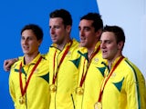 Cameron McEvoy, James Magnussen, Matt Abood and Tommaso D'Orsogna of Australia pose with their gold medals during the medal ceremony for the Men's 4 x 100m Freestyle Relay Final at Tollcross International Swimming Centre during day two of the Glasgow 2014