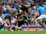 Ben Lam is hurdled by New Zealand teammate DJ Forbes on July 26, 2014