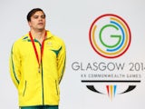 Gold medallist Ben Treffers of Australia stands on the podium during the medal ceremony for the Men's 50m Backstroke Final at Tollcross International Swimming Centre during day four of the Glasgow 2014 Commonwealth Games on July 27, 2014
