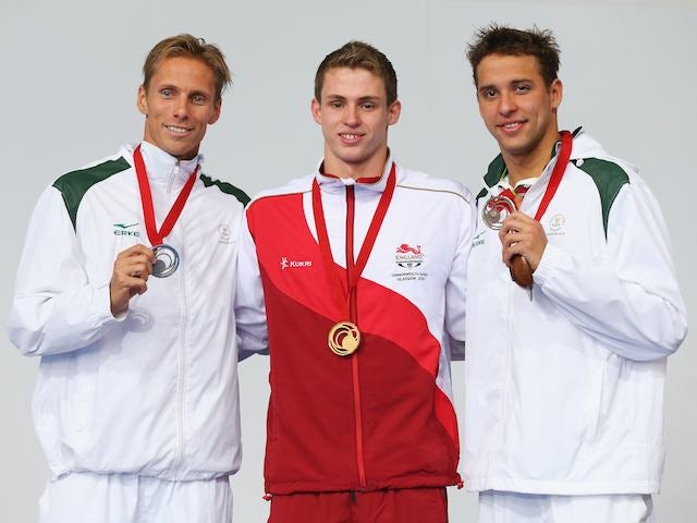 Medallists Benjamin Proud, Roland Schoeman and Chad le Clos in the men's 50m breaststroke on July 25, 2014