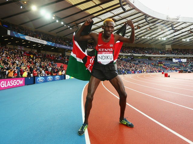 Caleb Mwangangi Ndiku of Kenya celebrates after winning gold in the Men's 5000 metres final at Hampden Park Stadium during day four of the Glasgow 2014 Commonwealth Games on July 27, 2014 