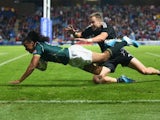 Cecil Afrika jumps to score a try on July 27, 2014