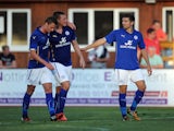 Chris Wood (C) of Leicester City celebrates with team-mate Andy King (L) after he scored the second goal of the game for his side during the pre season friendly on July 22, 2014