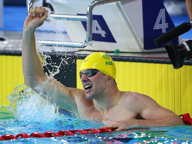 Australia's Daniel Fox celebrates setting a new world record in the men's parasport 200m freestyle B14 heat on July 26, 2014