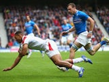 Daniel Norton of England scores a try in the semi final plate match between Scotland and England during the Rugby Sevens at Ibrox Stadium during day four of the Glasgow 2014 Commonwealth Games on July 27, 2014