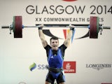 Cyprus's gold medalist Dimitris Minasidis competes in the men's weightlifting 62kg class at the 2014 Commonwealth Games in Glasgow, Scotland, 25th July 2014