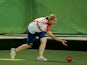 England's gold medal winner Ellen Falkner bowls during the women's lawn bowls final at Jawaharlal Nehru sports complex during the Commonwealth Games in New Delhi on October 11, 2010