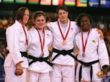 Bronze medalists Faith Pitman and Katie Jemima Yeats-Brown of England, Gold medalist Sarah Clark of Scotland and Silver medalist Helene Wezeu Dombeu on July 25, 2014