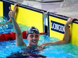 England's Francesca Halsall gives the thumbs-up after setting a new Games record in the semi-final of the women's 50m freestyle on July 25, 2014