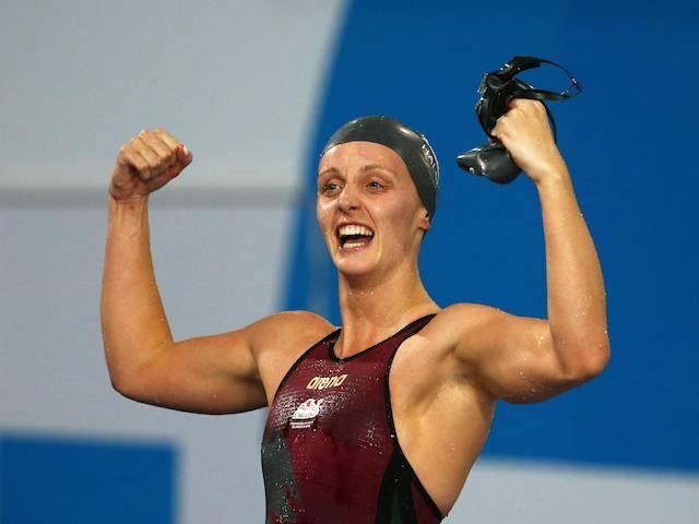 Francesca Halsall celebrates winning gold for England in the women's 50m freestyle on July 26, 2014
