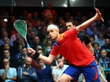 James Willstrop of England in action against Peter Barker of England during the semi-finals of the Canary Wharf Squash Classic on March 27, 2014
