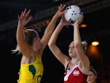 England's Joanne Harten and Australia keeper Laura Geitz battle for the ball on July 26, 2014