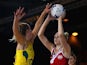 England's Joanne Harten and Australia keeper Laura Geitz battle for the ball on July 26, 2014