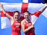 Jodie Stimpson and Vicky Holland celebrate winning gold and bronze for England in the women's triathlon on July 24, 2014