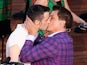 John Barrowman kisses a male performer during the Commonwealth Games opening ceremony on July 23, 2014