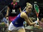 Laura Massaro of England plays a shot against Nour El Sherbini of Egypt during the Final of the CIMB Women's World Championships at the Spice Arena on March 23, 2014