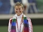 England's Natalie Melmore poses with her gold medal during the women's lawn bowls singles awards ceremony during the Commonwealth Games in New Delhi on October 13, 2010