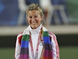 England's Natalie Melmore poses with her gold medal during the women's lawn bowls singles awards ceremony during the Commonwealth Games in New Delhi on October 13, 2010