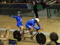 Scotland's Neil Fachie and pilot Craig Maclean Niblett celebrate winning the gold medal in the men's 1000m time trial B2 tandem race in the Sir Chris Hoy Velodrome during the 2014 Commonwealth Games in Glasgow, Scotland on July 25, 2014